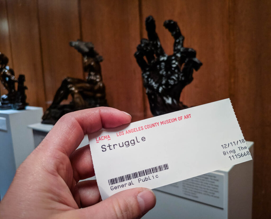 Cinematographer Dustin Pearlman holding his ticket to the Los Angeles premiere of Struggle at LACMA