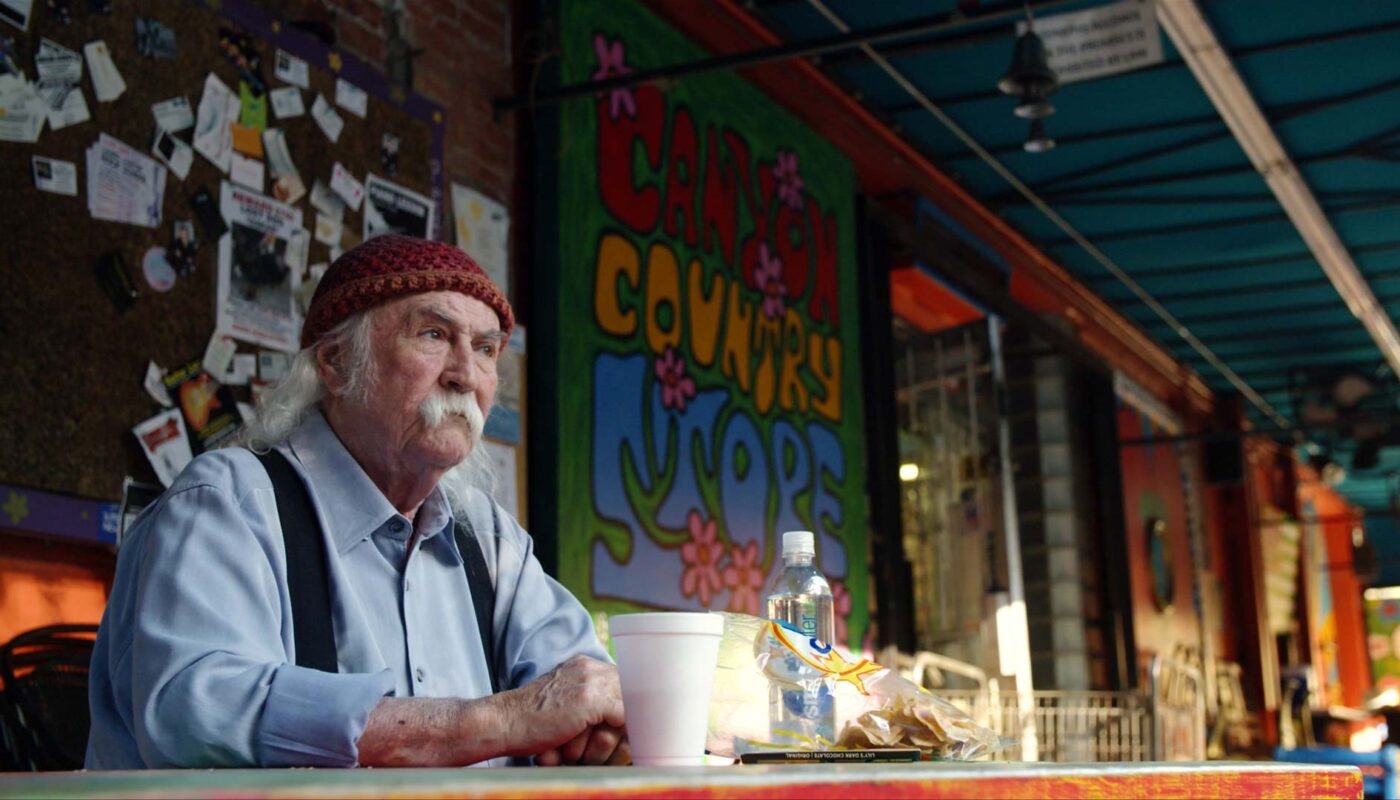 Frame grab from David Crosby: Remember My Name of Crosby sitting outside the Laurel Canyon Country Store