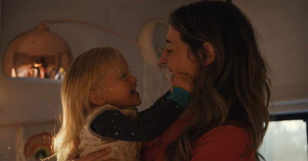 Magnolia and Mom embrace before bedtime