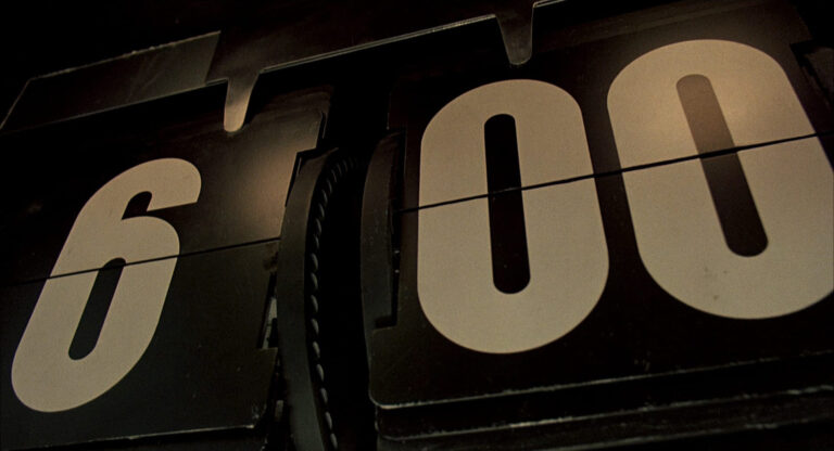 From the film, Groundhog Day, a giant clock reading 6:00AM