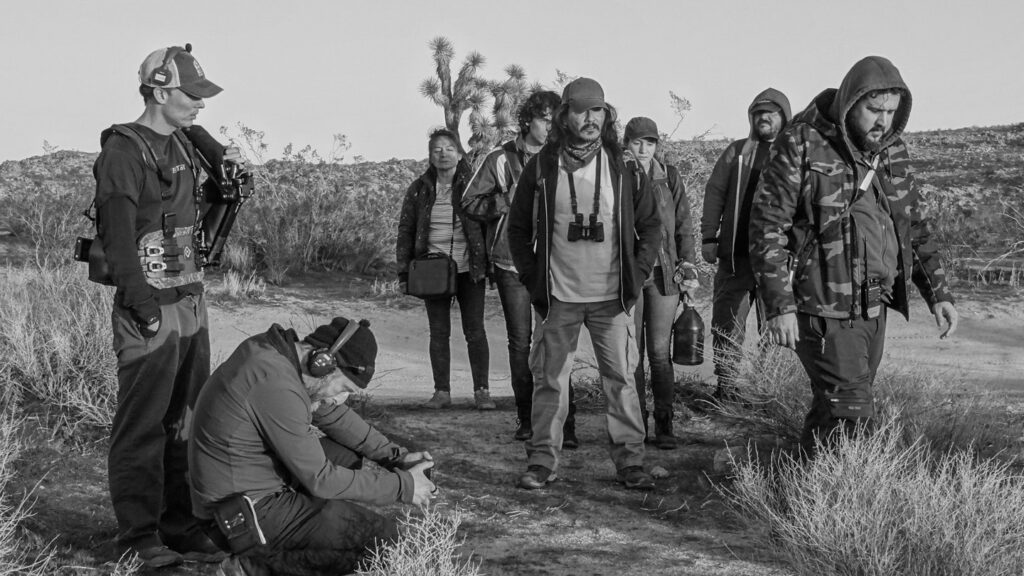 From the set of Illegal Aliens, Dustin lines up a shot with Artemis